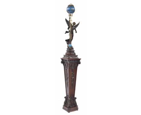 Good French bronzed mystery clock, the movement housed in a powder blue globe casing over a pendulum held aloft by a winged f