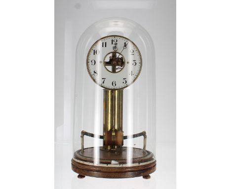 Bulle electric mantel clock, the 5.25" chapter ring enclosing a skeletonised centre, upon a cylindrical brass battery column,