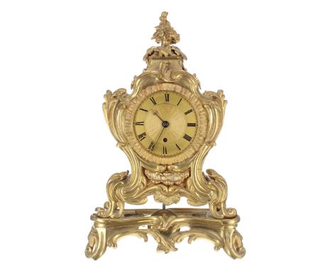 Good English ormolu single fusee mantel clock, the 3.75" chapter ring enclosing an engine turned centre, within a rococo foli