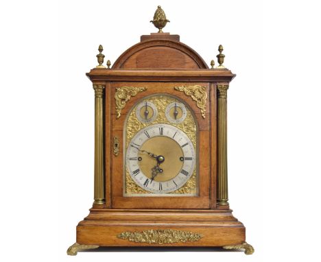 Good English oak triple fusee boardroom clock, the 7" brass arched dial with silvered chapter ring enclosing a matted centre 