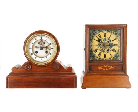 Small French mahogany two train drumhead mantel clock, the movement back plate bearing the Henry Marc of Paris trademark logo