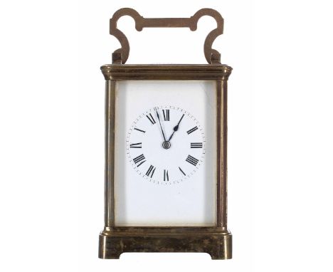 French carriage clock striking on a gong, within a corniche brass case, 7.25" high 