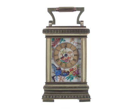 Miniature carriage clock timepiece mounted to the front and sides with ornithological painted porcelain panels, within a flut
