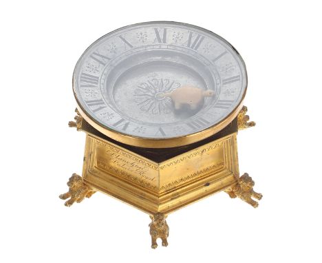 Reproduction ormolu and silvered turtle table clock, the 5" silvered chapter ring enclosing a recessed centre with turtle poi