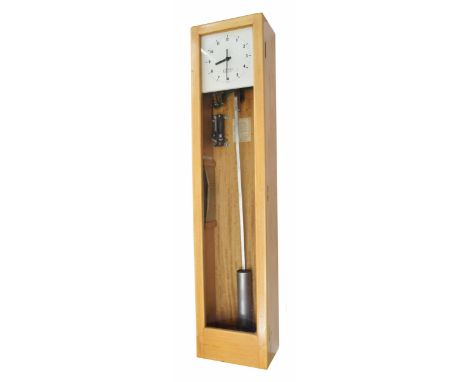 Gents electric master wall clock, the 8" square dial within a glazed light oak case, 50.5" high 