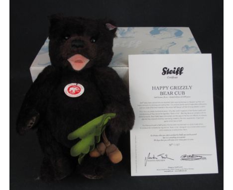 Modern Steiff 'Happy Grisly Bear Cub', dark brown, 26cm high, limited edition no. 1197/2009, in original box with certificate