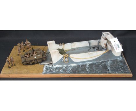 Scale model Diorama of a British Landing Craft with Bren gun carrier and Limber with figures, 55 x 25.5cm approx.
(B.P. 24% i