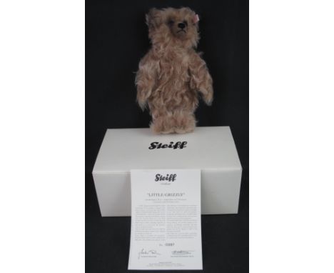 Modern Steiff 'Little Grisly Growler Bear', caramel tipped, 28cm high, limited edition of 7500 pieces, no. 00087, in original