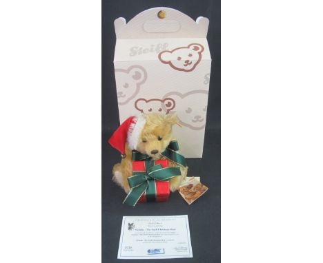 Modern Steiff 'Nicholas, Christmas Bear', serial no. 0016, in original box with certificate of authenticity.
(B.P. 24% incl. 