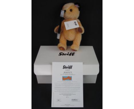 Modern Steiff 'Sooty' teddy bear, EAN664137, yellow, 26cm high, limited edition until May 2013, no.51, in original box with c