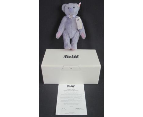 Modern Steiff 'Krystabelle' lilac teddy bear, no.: 85, the year: 2013.  In original box with certificate of authenticity etc.