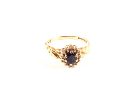 A 9ct gold sapphire and diamond cluster ring, size K