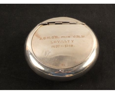 A silver oval 'squeeze' snuff box, with inscription