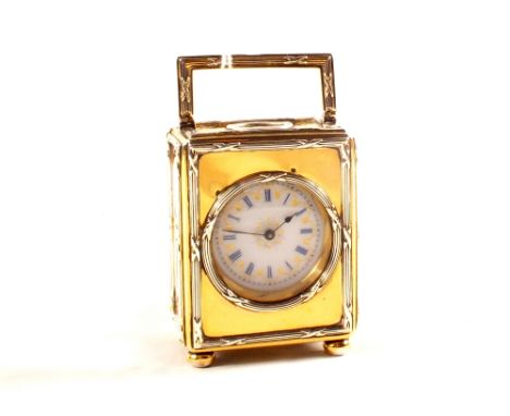 A miniature silver gilt carriage clock with enamel dial, J.Vickerry Regent St London 1915