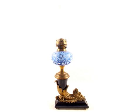 An unusual oil lamp of brass mask cornucopia form on blue porcelain base and mount plus a blue mottled bowl