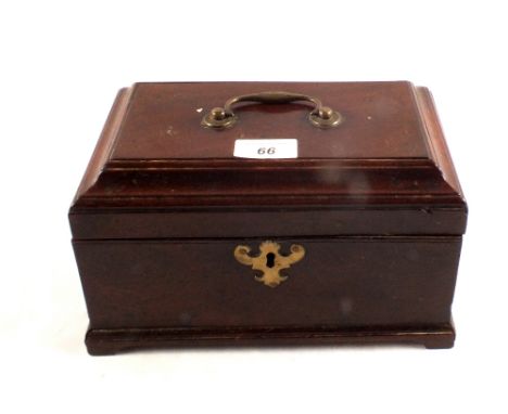 An antique mahogany Chippendale style three division tea caddy with brass handle and escutcheon and bracket feet