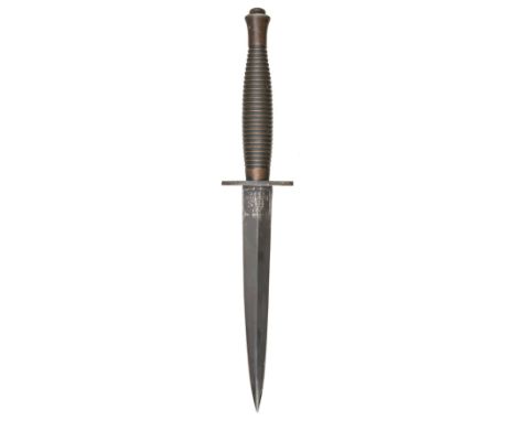 * Fighting Knife. A Fairbairn-Sykes 3rd Pattern Fighting Knife by Wilkinson Sword Co Ltd London, the 16 cm blackened steel bl