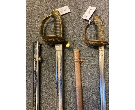 * Swords. A Victorian 1845 pattern infantry officer's sword, the 82.5 cm slightly curved steel blade numbered 96794 and engra