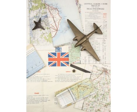 * Escape &amp; Evasion. A WWII RAF button compass, together with a saw blade, a paper "goolie" chit printed in French, German