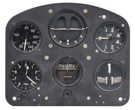 * Cockpit Instruments. An aircraft instrument panel containing turn slip, artificial horizon, airspeed and directional gyro b