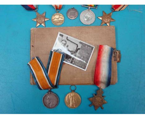 WWI and WWII, Family Group: 1914-1918 Trio 1891 Pte. F. T. Wilson. Manch.R., 1939-1945 Service Medal, Star and Africa Star R.