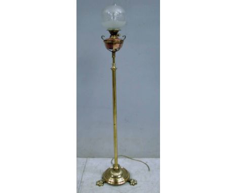An Arts and Crafts floor standing rise and fall telescopic copper and brass Oil Lamp by Hinks, converted to electricity but r