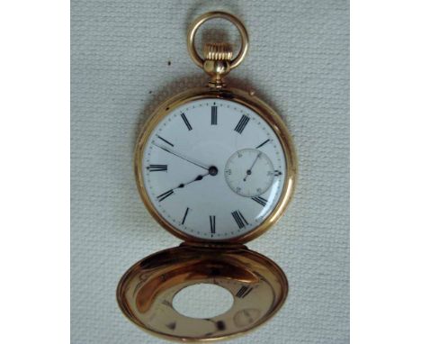 An 18ct gold cased Half Hunter Pocket watch, white enamel dial, 38mm with Roman Numerals, subsidiary seconds dial at 6, front