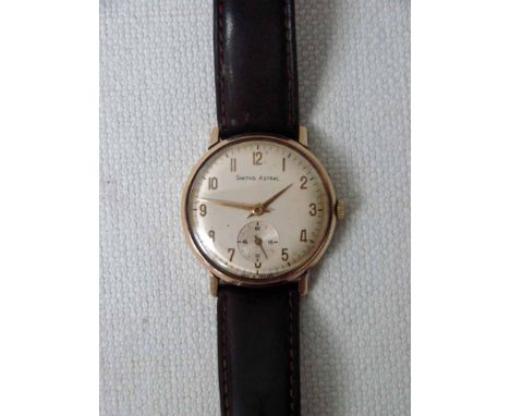 A Smiths Astral 9ct gold cased gentleman's wrist watch, circular champagne silvered dial, Arabic numerals and batons, subsidi
