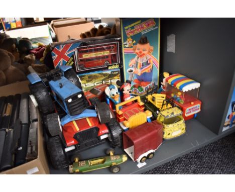 A box of mixed toys including Solido London Buses, boxed, Tonka Tractor, Fu Shin Toys Mr Bob, boxed, etc