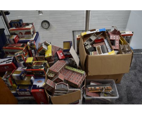 A collection of Hornby, Bachmann and similar 00 gauge cardboard building, made up with boxes seperate
