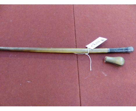 A SILVER MOUNTED HORN CROP OR SWAGGER STICK AND A HORN CANE TOP