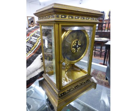 A GOOD VICTORIAN GILT BRASS AND ENAMEL THREE GLASS MANTLE OR DESK CLOCK. SILVERED DIAL, TWO TRAIN GONG STRIKE MOVEMENT, SIGNE
