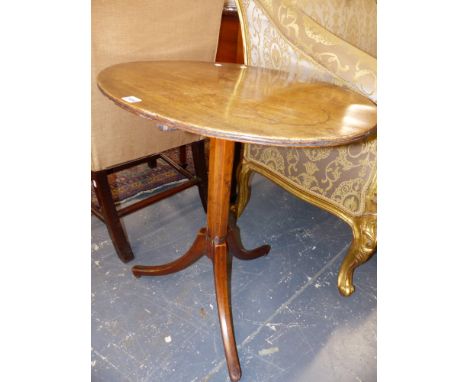 A GEORGIAN MAHOGANY TILT TOP TRIPOD TABLE WITH OVAL TOP.   66cms  WIDE