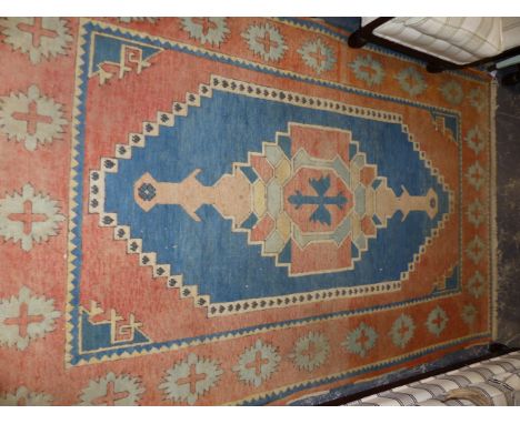 A TURKISH CARPET OF CAUCASIAN DESIGN.