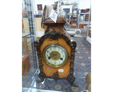 A VICTORIAN WALNUT AND BRASS MOUNTED MANTLE CLOCK