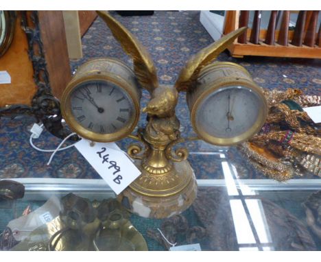 A VICTORIAN GILT BRASS DESK CLOCK AND BAROMETER WITH EAGLE SURMOUNT 