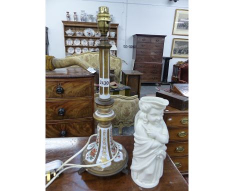 A BOHEMIAN GLASS LAMP BASE WITH GILT METAL MOUNTS. 45CM HIGH TOGETHER WITH A WHITE GLAZED CHARACTER JUG OF A WOMAN. 25CM HIGH