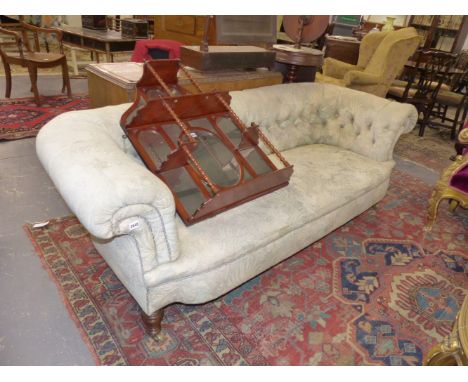 A VICTORIAN LOW BUTTON BACK UPHOLSTERED CHESTERFIELD SETTEE.   APPROX 205cms WIDE., MAKER HOLLAND & SONS, STAMPED  UNDERNEATH