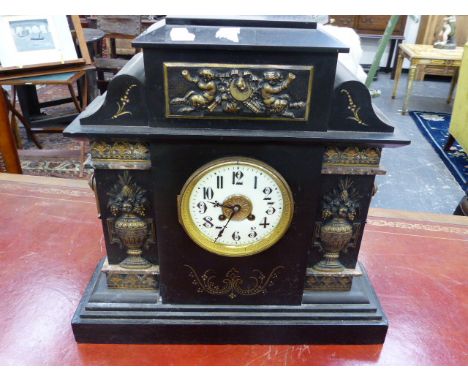 A  LARGE VICTORIAN SLATE MANTLE CLOCK AND ONE OTHER SMALL CLOCK.