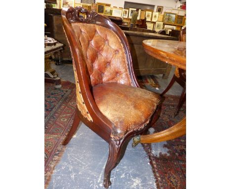 A SET OF TEN VICTORIAN MAHOGANY CARVED SHOW FRAME BUTTON LEATHER UPHOLSTERED DINING CHAIRS.