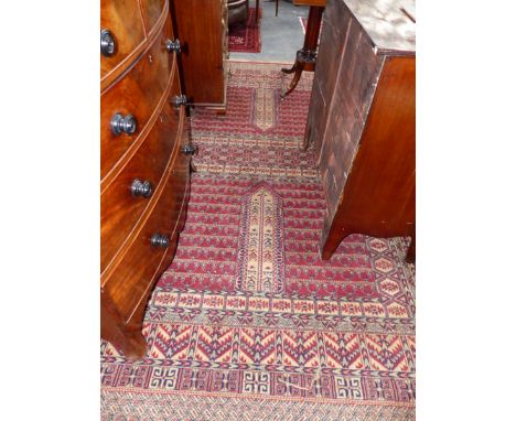 A LARGE PERSIAN PATTERN CARPET