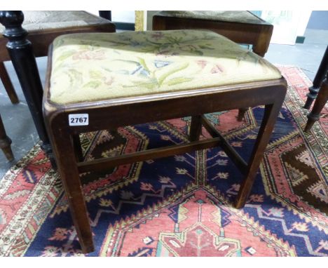 AN ANTIQUE MAHOGANY DRESSING STOOL WITH TAPESTRY TOP.