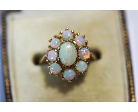 A 9 carat gold opal cluster ring, finger size L, 3.5 g gross