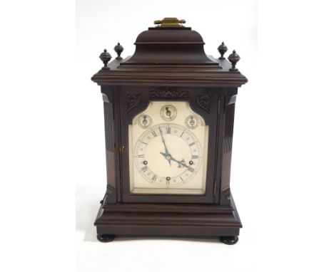 A W & H mahogany bracket clock, later 19th century quarter chime on either eight gongs or four gongs