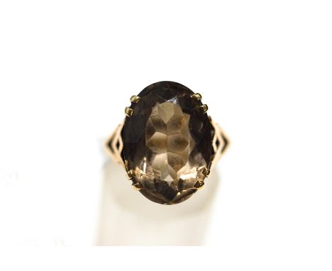 A 9 carat gold smoky quartz ring, finger size M, 6.8g gross