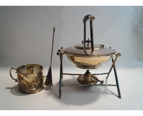 A silver plated kettle on stand, with burner; and a Hurricane chamber stick, lacking glass chimney