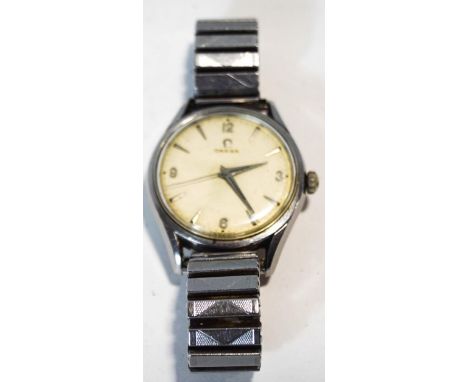 Omega, a gentleman's mechanical wrist watch, the circular signed white dial with dagger batons and Arabic quarters, hands and