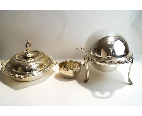 An electroplated revolving breakfast dish, with draining tray insert; an oval entree dish and cover; and a sugar basin 