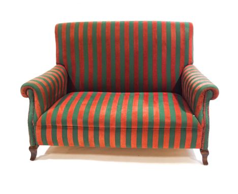 An early 20th century two seat sofa, upholstered in green and red striped fabric, with brass studding, 146cm wide