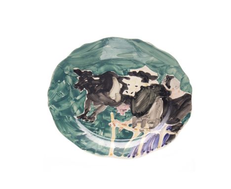 * ALEXANDER GOUDIE RP RGI (SCOTTISH 1933 - 2004), TWO COWS IN A FIELD painted ceramic plate, signed verso 26cm wide